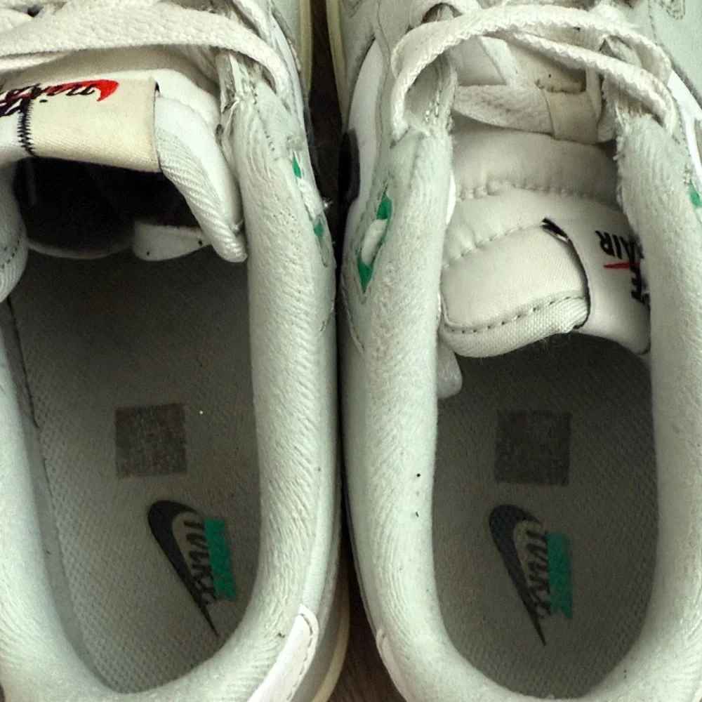 Nike Kids White and Gray Sneakers with Green Accents